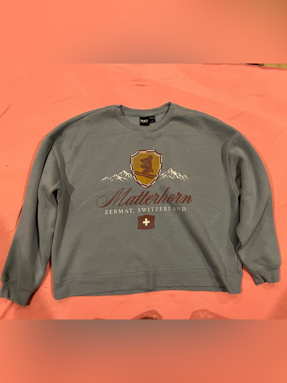 MAD Engine Blue Crewneck with Gold & Red Matterhorn Crest
